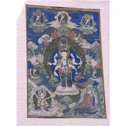 Antique Tibetan thanka with well-detailed cen