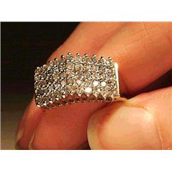 14K yellow gold ring, set with numerous diamo
