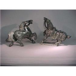 Two large and elaborately carved