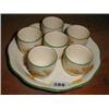 Image 1 : A c1910/15 set of six egg-cups on stand wi...