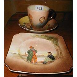 A Royal Doulton trio with hand-painted  Di...