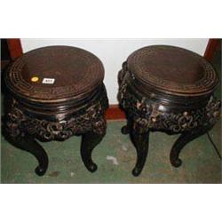 A pair of C19th oriental modern carved pot...