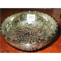 A green Carnival glass bowl with grapevine...