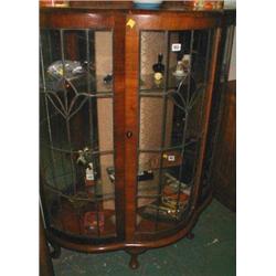 A c1930's leaded glass clover-shaped displ...