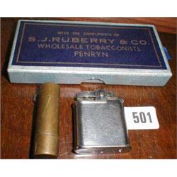 A Ronson lighter, a brass lighter and a bo...