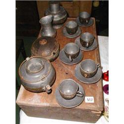 A C19th Japanese carved coconut and pewter...