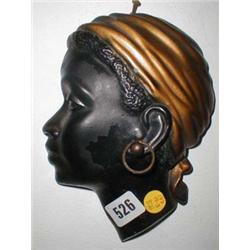 A c1930's plaster wall plaque of an Africa...