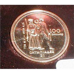 A gold $100 coin commemorating 1976...