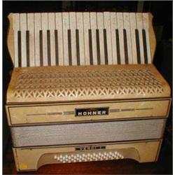 A Hohner Verdi I accordian...