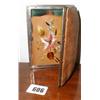 A leather cigar case with embroidered pock...