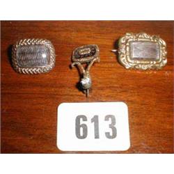 Three hair broaches, one inscribed around ...