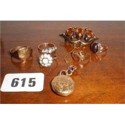 Five 9ct gold rings including one set with...