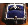 A large diamond solitaire ring with an 18c...