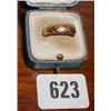 An 18ct gold gentleman's wedding band...