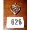 A blue sapphire and diamond heart shaped p...