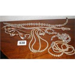A small collection of cut crystal beads an...