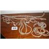 A small collection of cut crystal beads an...
