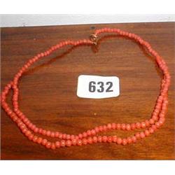A partly double strung coral necklace...