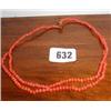 A partly double strung coral necklace...