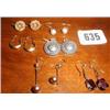 A quantity of earrings, some gold...