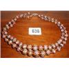 A double strung set of Venetian beads...