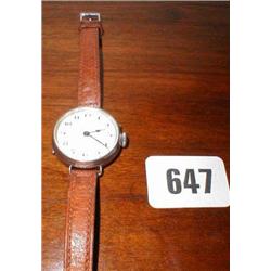 A silver ladies wrist watch with leather s...