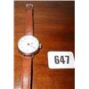 A silver ladies wrist watch with leather s...