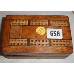 A folding cribage board/card holder...