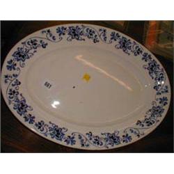 A blue and white plate by Woodcock and son...