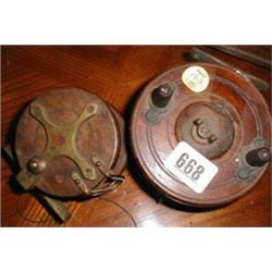A 3" Ogdens fishing reel together with one...