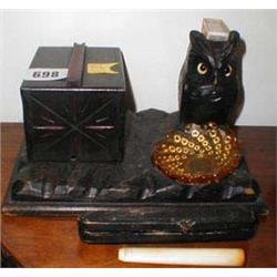 A C1920's carved wooden smokers campanion ...