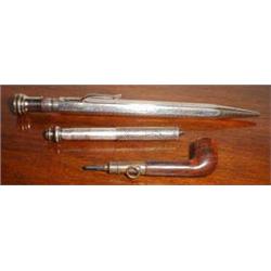 A pencil in the form of a pipe together wi...
