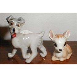 A Wade Whimsey Disney dog together with a ...