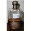 Image 1 : A silver-topped glass hip flask with silve...