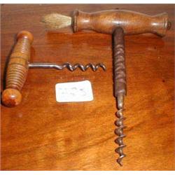 Two C19th wooden handled corkscrews...
