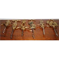 Six brass topped corkscrews...