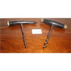 Two C19th ebony handled corkscrews...