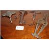 Image 1 : Four all metal corkscrews including one in...
