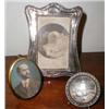 Image 1 : A C19th miniature silver picture frame tog...