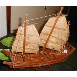 A hand carved wooden model of a "Junk"...