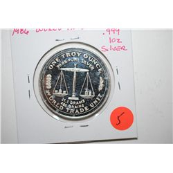 1986 World Trade Unit Silver Round; 99.9% Pure Silver 1 Oz.; EST. $30-40