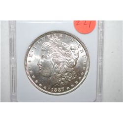 1887 Silver Morgan $1; MCPCG Graded MS63; EST. $65-90