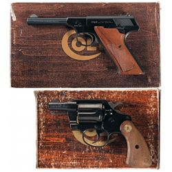 Two Boxed Colt Handguns
