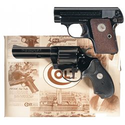 Two Boxed Colt Handguns