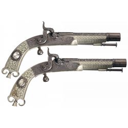 Matching Pair of Engraved German Silver Stocked Meyer & Mortimer English Percussion Pistols with Let