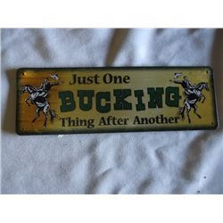 Tin Sign One Bucking Thing One Bucking Thing after Another approx 10 1/2 x 3 1/2"