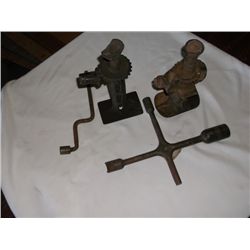 Old auto jacks and lug wrenches