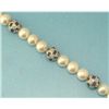 Image 1 : 18K GOLD PEARL AND DIAMOND BRACELET