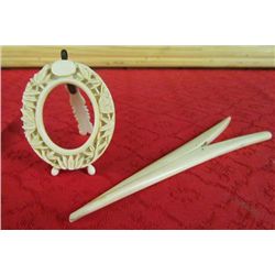 2 pieces of Oxbone - one carved picture frame and one glove stretcher