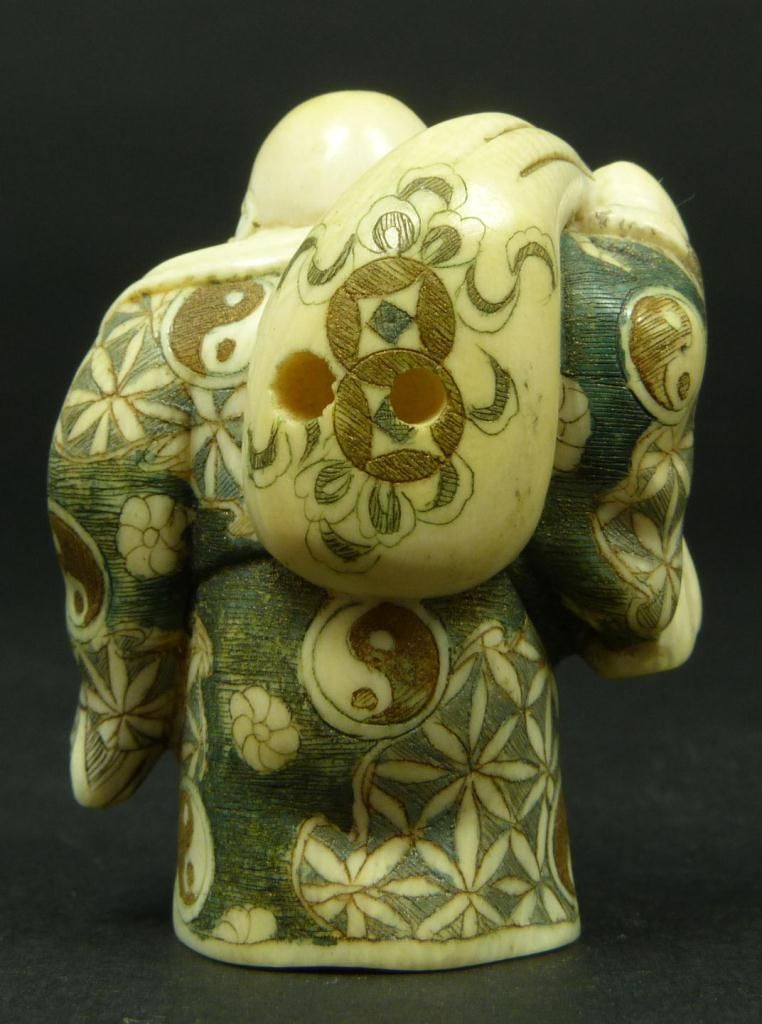 JAPANESE CARVED IVORY NETSUKE OF BUDDHA